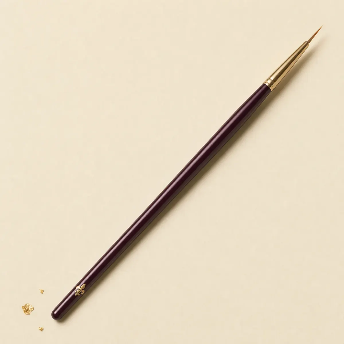 A slim brush with a very fine, pointed liner tip.