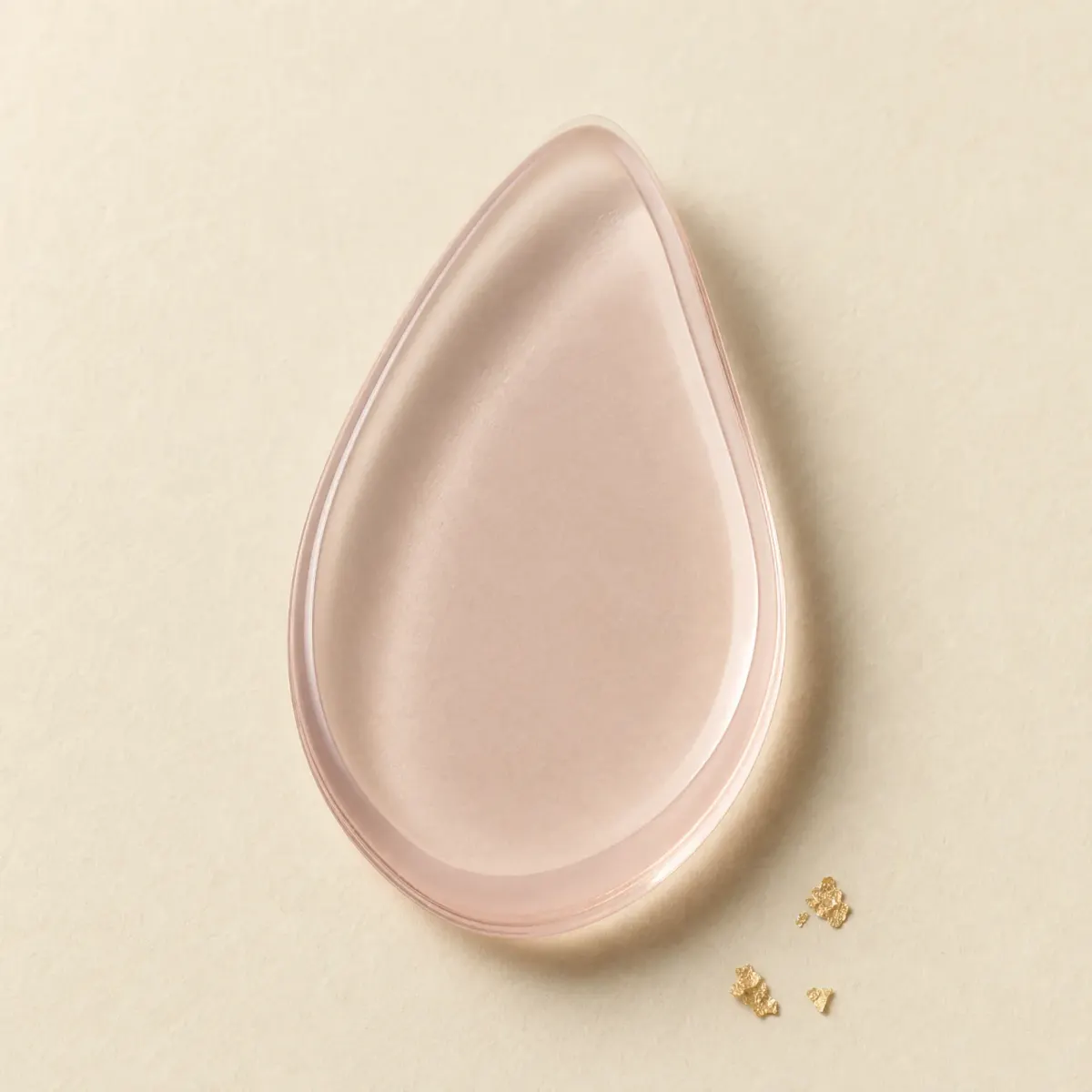 A translucent silicone makeup applicator.