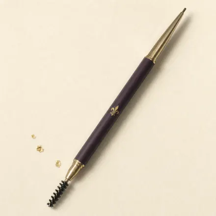 A very slim retractable brow pencil with a spoolie at the other end.