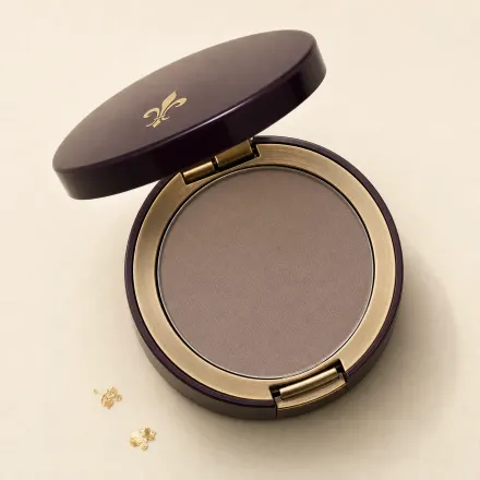 An open compact of cool taupe matte contour powder.